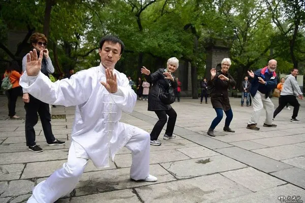 Tai Chi & Houhai Lake Bike Adventure: Beijing's Cultural Heartbeat