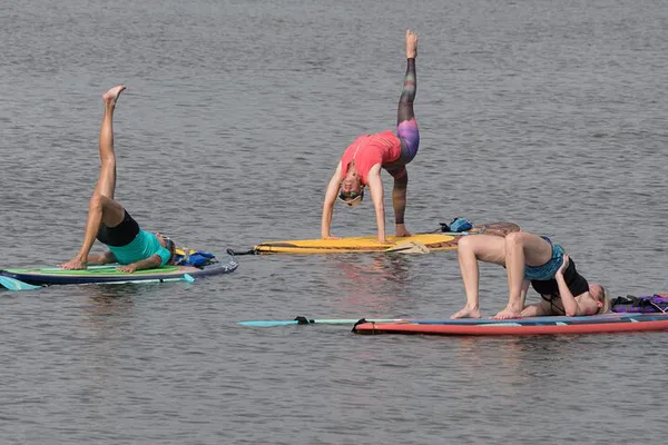 SUP Yoga: Float Into Fitness & Nature!