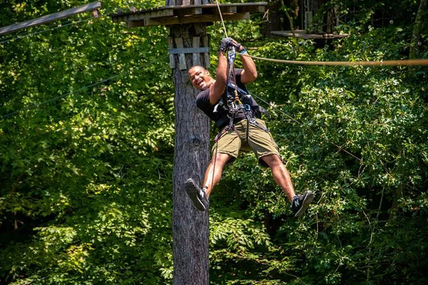Nashville's Thrilling Treetop Adventure: Ziplining & Climbing!