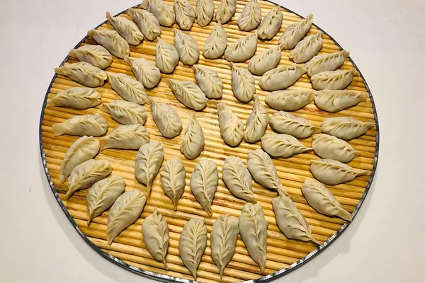 Unleash Your Inner Chef: Beijing Cooking Class & Badminton Adventure!