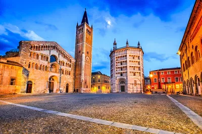 Parma's Golden Glow: A Nighttime Historical Adventure