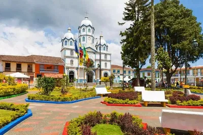 Discover Quindío's Charm: Thermal Baths & Finland Village Tour