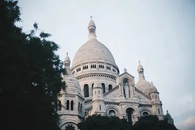 Discover Paris: Montmartre Walk & Seine River Cruise with Private Transfer!