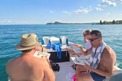 Lake Garda Sunset Cruise: Wine, Fish & Views!