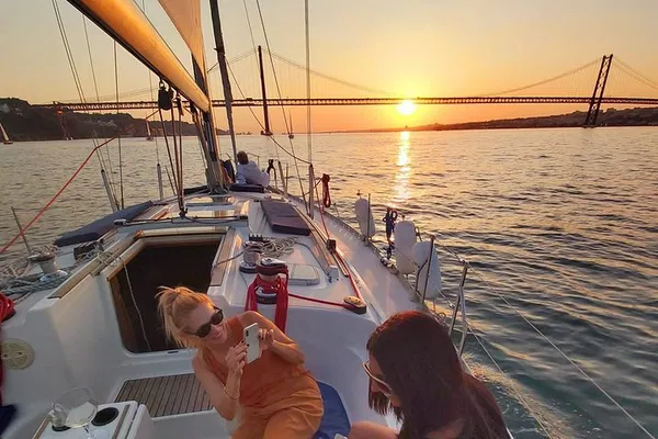Lisbon Sunset Sail: Wine, History, & City Views