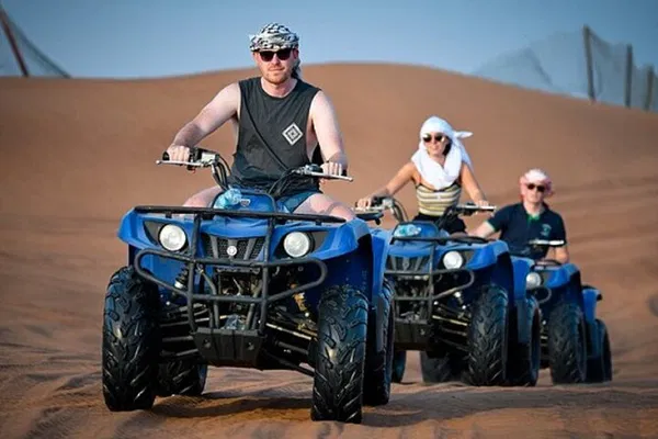 Thrilling Desert Adventure: Dune Bashing, Quad Bike & Camel Ride in Dubai