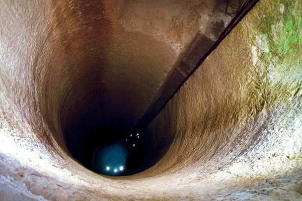 Unearth Orvieto's Secrets: Journey into Pozzo della Cava's Depths