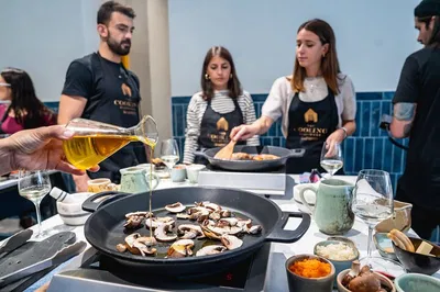 Madrid Paella Class: Cook, Wine & Dine!
