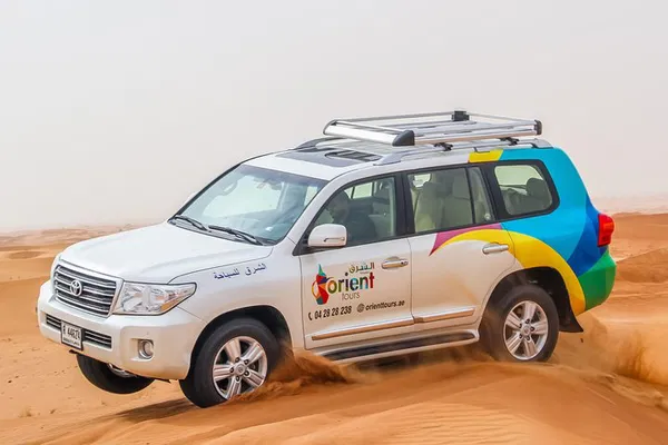 Dubai Desert Safari: BBQ, Red Dunes & Thrills!