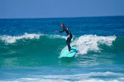 Catch a Wave: Personalized Surf Lessons on Leucadia Beach!