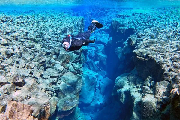 Silfra Snorkeling Adventure: Dive into Iceland's Crystal-Clear Waters