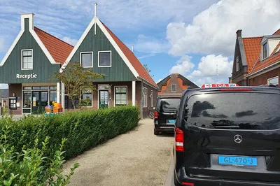 Unveiling Zaanse Schans: A Luxurious Windmill Journey from Amsterdam