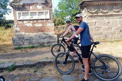 Rome's Hidden Depths: Bike & Catacombs Adventure