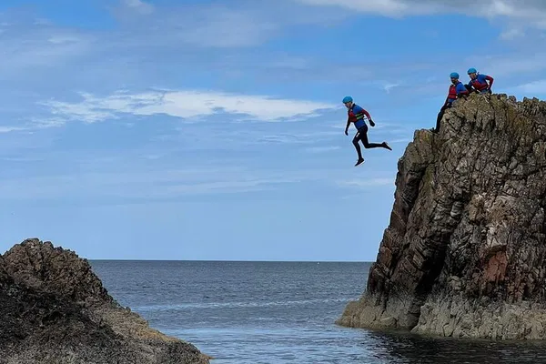 Portknockie Coasteering: Explore Bow Fiddle Rock!