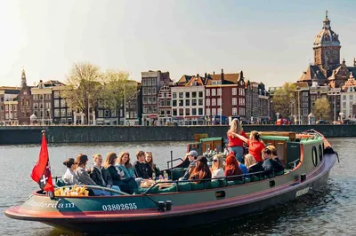 Amsterdam Canal Cruise: Historic Tugboat Tour