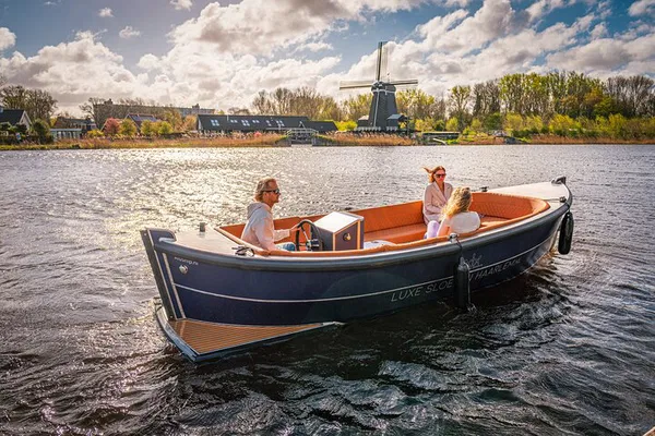 Glide Through Haarlem: Eco-Friendly Boat Rental Adventure
