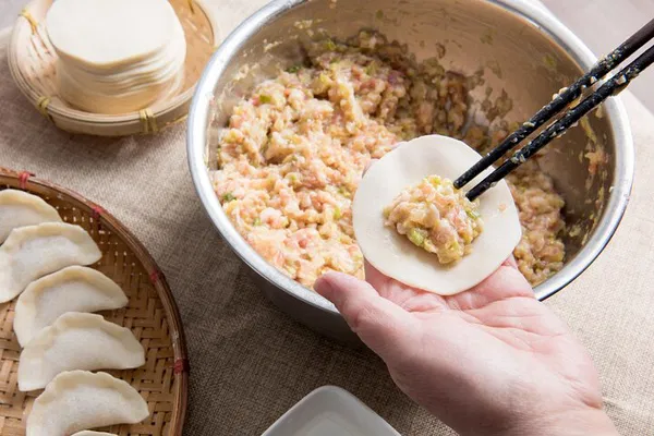 Unlock Beijing's Flavors: Dumpling Class & Market Tour!