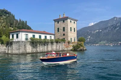 Glide Through Lake Como's Splendor: A Private Wooden Boat Adventure