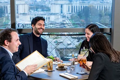 Parisian Delights: Eiffel Tower Lunch, Seine Cruise & Louvre Adventure