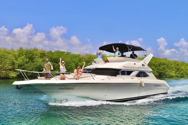 Luxury Cancun Getaway: Private SeaRay Yacht Adventure!