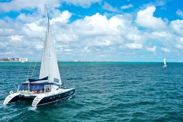 Discover Puerto Morelos Reef: Catamaran, Snorkel & Marine Life Adventure!