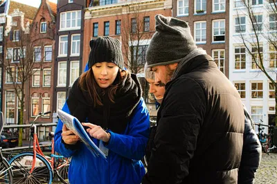 Unveiling Amsterdam's Secrets: An Italian Guided Walking Tour