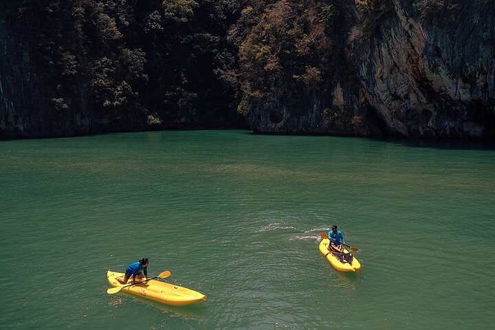 Hong Island's Nocturnal Canoe Adventure: Bioluminescent Waters Await!