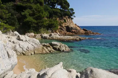 Uncover Costa Brava's Charms: A Private Tour with Boat Ride & Ancient Ruins