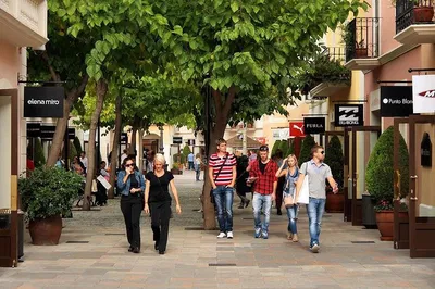 Luxury Shopping Getaway: Private Barcelona to La Roca Village Experience
