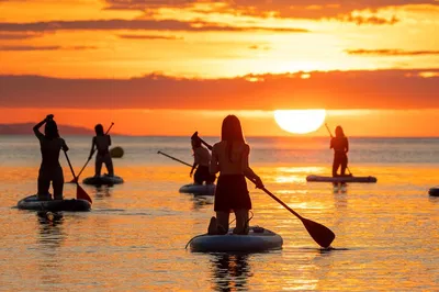 Glide into Sunrise: Paddle Surf Adventure in Barcelona with Expert Guidance & Photos!