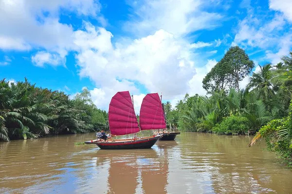 Mekong Delta Adventure: Scooter, Sailboat & Authentic Cuisine!