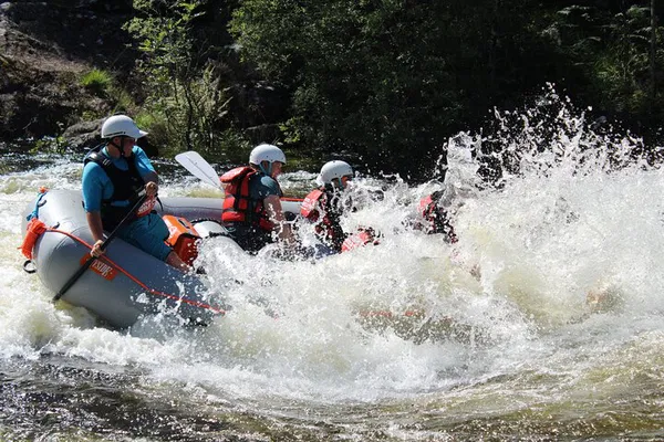 Conquer Scotland's River Garry: Thrilling White Water Rafting Adventure!