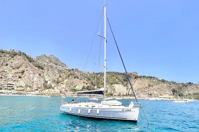 Explore Acitrezza: A Coastal Sailing Boat Tour Adventure!