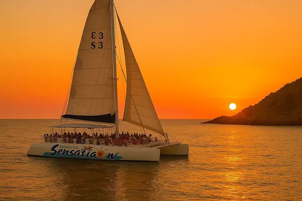Sunset Catamaran Cruise with DJ & Drinks in Lloret!