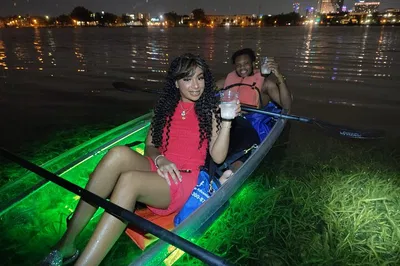Orlando's Enchanting Night Paddle: Clear Kayak, City Lights & Bubbly Bliss!