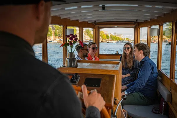 Amsterdam Canals: Private Boat Tour with Drinks & Historic Charm