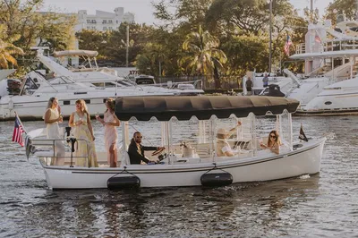 Miami River E-Boat Cruise: Wine, Skyline & Wildlife Wonders!
