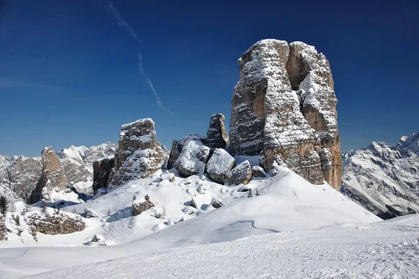 Carve Cortina's Slopes: A Guided Ski Adventure Through the Dolomites!