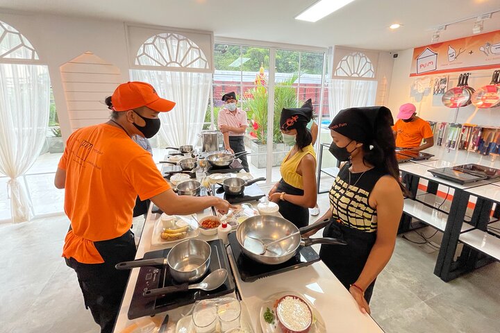 Embark on a Flavorful Journey: Authentic Thai Cooking Class & Market Tour in Phuket