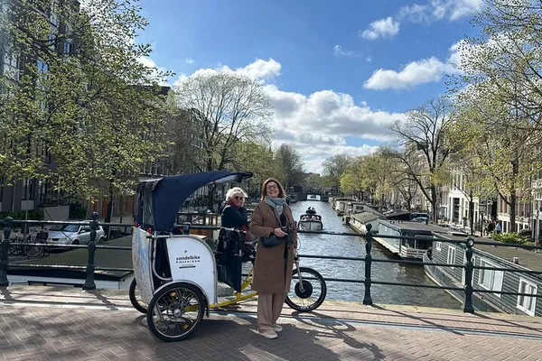 Amsterdam Rickshaw Adventure: Uncover Hidden Gems in 60 Minutes!