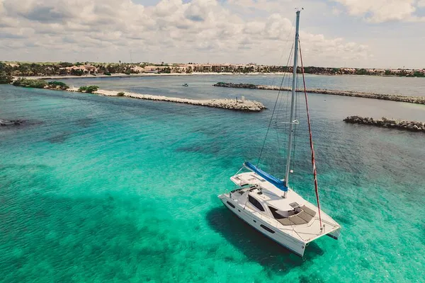 Luxury Cozumel Cruise: Private Catamaran Adventure with Snorkeling & Sunset Views