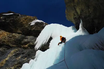 Conquer Frozen Falls: Dolomites Ice Climbing Adventure