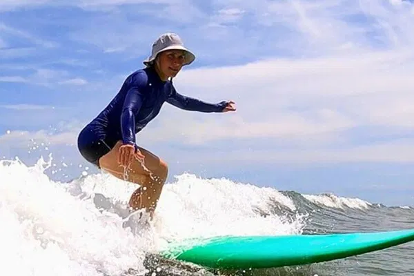 Ride the Waves: Conquer Da Nang's Shores with a Surf Lesson!