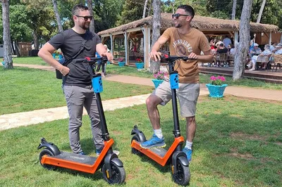 Glide Through Poreč: E-Scooter Green Lagoon Adventure!