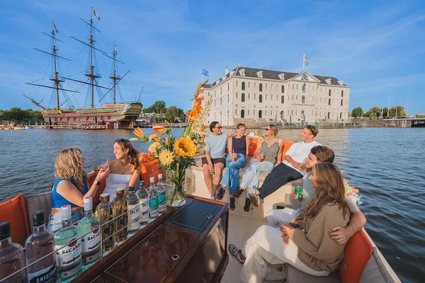 Amsterdam's Electric Canal Cruise: Unlimited Drinks & Iconic Views!