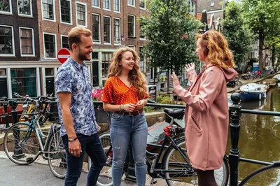 Uncover Amsterdam's Secrets: A Personalized Bike & Foot Tour