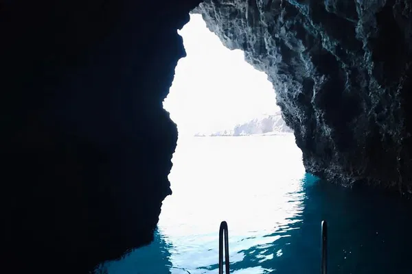 Discover Taormina's Coastal Gems: A Boat Excursion to Isola Bella & Blue Grotto