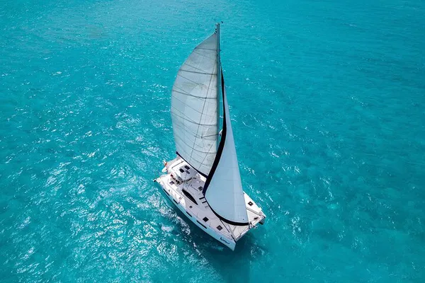 Isla Mujeres: Luxury Sailing & Snorkel Adventure!