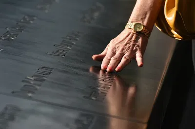 Unveiling NYC's Icons: Liberty, Ellis Island & 9/11 Memorial - A Reflective Journey