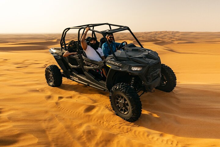 Thrilling Dubai Desert Adventure: Quad Biking, Camel Rides & BBQ!